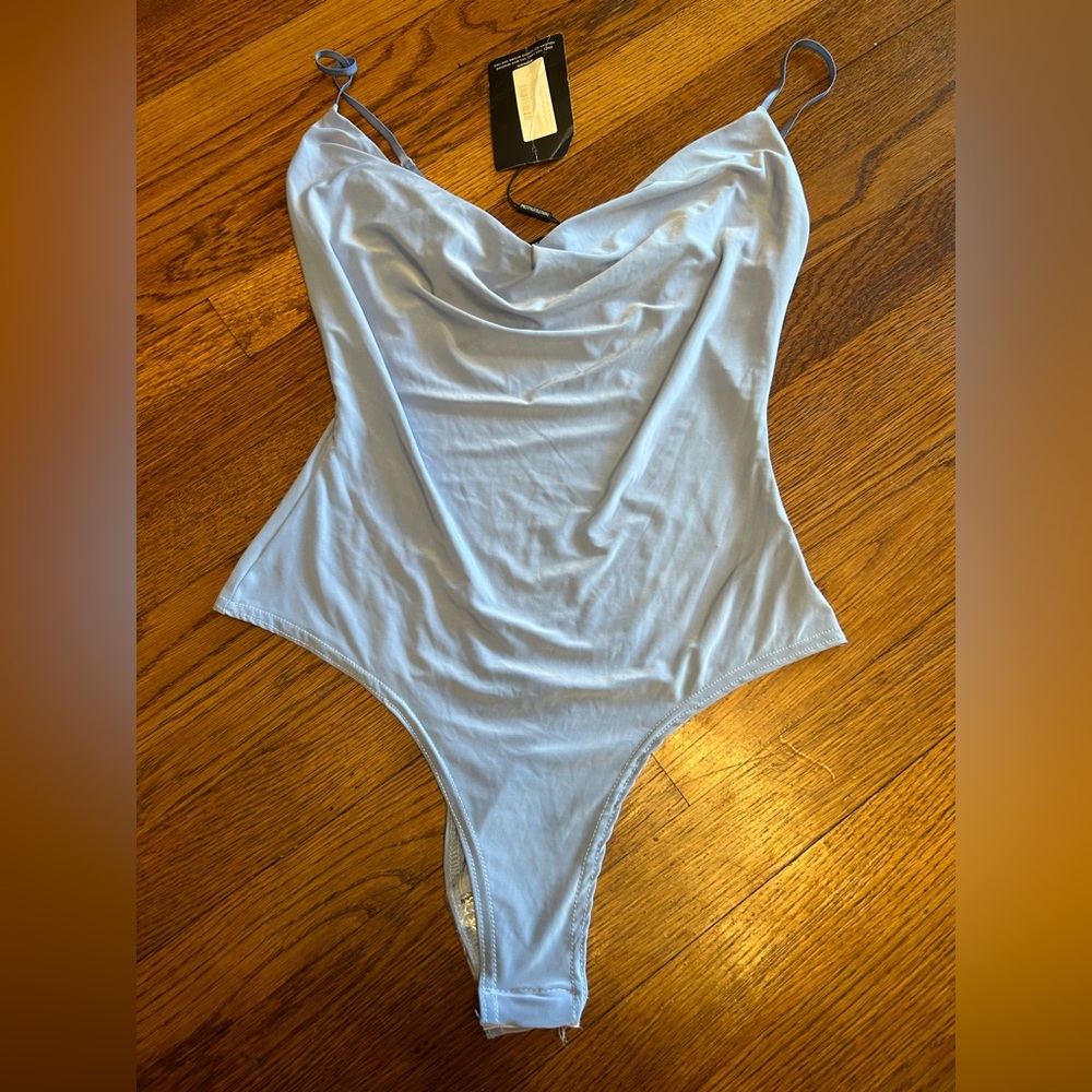 NWT blue bodysuit